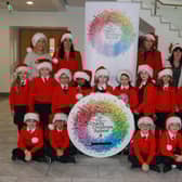 St. Joseph’s Convent Primary School Primary 3 pupils getting ready to escort Santa Claus on Wednesday 6th December at the Canal Court Hotel for the Annual Newry Business Xmas Charity Dinner and Toy Appeal. Pupils pictured with Mary Doran, Caroline Grant, Caroline Courtney organisers and their Principal Doreen O’Neill. INNR4702