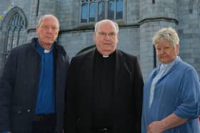 United outside Newry Cathedral are (left to right) Church of Ireland Rector Canon Scott McDonald, Newry Cathedral Parish Administrator Canon Francis Brown and Rev Louise Donald of the Methodist Churches of Newry, Bessbrook and Warrenpoint (Photo: Columba O’Hare)