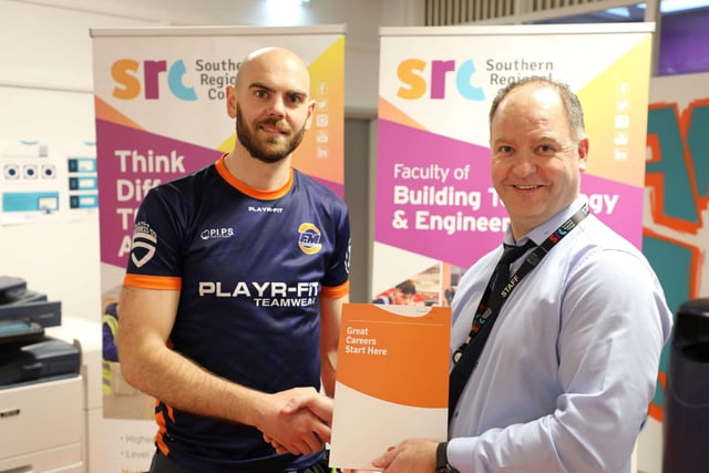 Apprentice Josh Porter from Newry who took 1st place in the Electrical Installation SRC SkillBuild competition.  Josh is pictured alongside Curriculum Area Manager Gareth Mone.