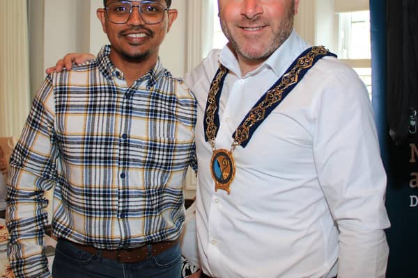 Siju George representing Newry Indian Arts Club with Chairperson Councillor Pete Byrne.