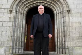 Canon Francis Brown is making a stand for Newry Cathedral Parish against NMDDC. .
