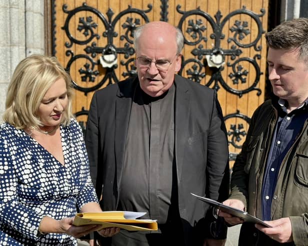 Caption: Canon Francis Brown, ADM of Newry Cathedral Parish with Kathleen O'Hare, Vice Chair of the Parish Pastoral Council and Glenn Ryan, member of the Pastoral Council and Deputy Grand Knight of the Knights of St Columbanus.