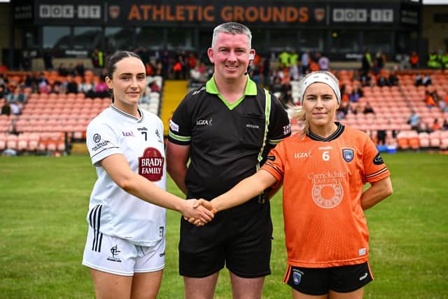 4 July 2026; Referee Anthony Marron, centre, is joined by Kildare captain Laoise Lenehan, left, and Armagh captain Lauren McConville ahead of the LGFA TG4 All-Ireland Senior Championship quarter-final match between Armagh and Kildare at BOX-IT Athletic Grounds in Armagh. Photo by Shauna Clinton/Sportsfile
