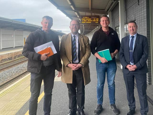 SDLP MLA Justin McNulty and Cllr Killian Feehan with Translink representatives.