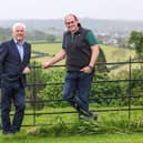 Former Ulster and Ireland rugby star and Co. Armagh arable farmer Simon Best is teaming up with the British Heart Foundation NI at the Balmoral Show to encourage his fellow farmers to be aware of their heart health. Pictured with Simon at his farm in Poyntzpass, Newry is Fearghal McKinney, head of BHF NI.