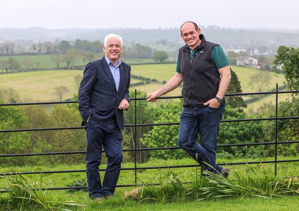 Former Ulster and Ireland rugby star and Co. Armagh arable farmer Simon Best is teaming up with the British Heart Foundation NI at the Balmoral Show to encourage his fellow farmers to be aware of their heart health. Pictured with Simon at his farm in Poyntzpass, Newry is Fearghal McKinney, head of BHF NI.