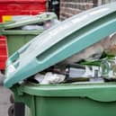 A stock image of a recycling bin.