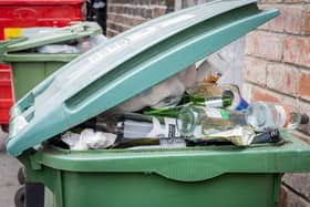 A stock image of a recycling bin.