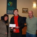 Chairperson Newry, Mourne and Down Council, Councillor Valerie Harte and Councillor Michael Ruane at the presentation of a cheque to Ryan McAleenan who leaves on Friday 17th November to join 50 leading GAA Stars in planting 1 million trees in Africa. INNR4800