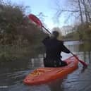 Police kayak to reach a drink-driver whose car got stuck in floodwater 