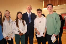 St Paul's High School Principal Dáithí Murray with GCSE students l-r Alex Flynn, Grace Reabey, Jessica Murphy, Ned Clarke, Ned Clarke and Conor Sands. INNR3432