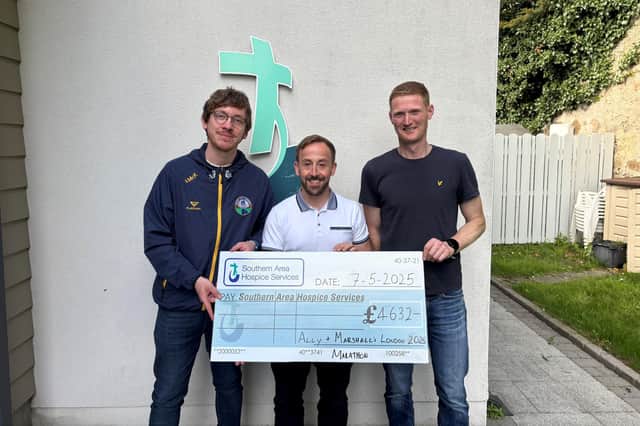 Ally McKenzie and Marshall Patterson with James McCaffrey (centre) of Southern Area Hospice Services.