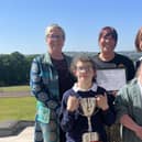 Carole Johnston-Thompson, a parent who nominated the school for the award; Mrs Edel Lavery, Principal; Mrs Tori Kirk, Donard staff member; Carly McCann and Lucy Cunningham, pupils.