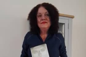 Debra with her latest book 'No Place for a Woman'