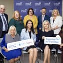 Together for Families launch at St Comgall's Belfast. L-R: Paul Sweeney, Northern Ireland Chair, The National Lottery Community Fund; Naomi Long MLA Minister of Justice; Kate Beggs, Northern Ireland Director, The National Lottery Community Fund; Robbie Butler MLA Minister of Health; Jacinta Linden, Together for Families Co-Director; Eilis McDaniel, Director of Social Care Reform, Department of Health; Dame Julia Cleverdon, Chair of The National Lottery Community Fund, Emma Little-Pengelly MLA, deputy First Minister; Michelle O’Neill MLA, First Minister; Sarah Owen MP, Parliamentary Under-Secretary of State for Northern Ireland.