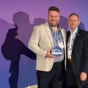 Alan O'Reilly accepting his award with MJM's CEO Gary Annett.