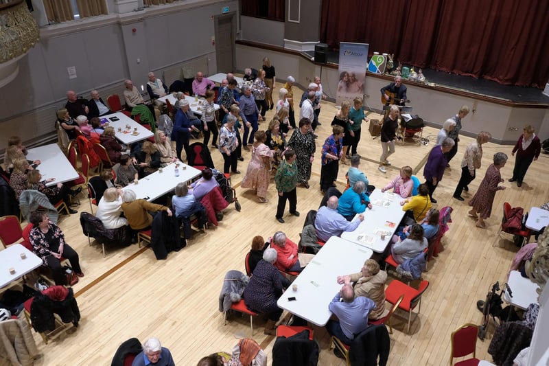 Line dancing in full flow at the Newry, Mourne and Down District Council Tea Dance in Newry Town Hall.