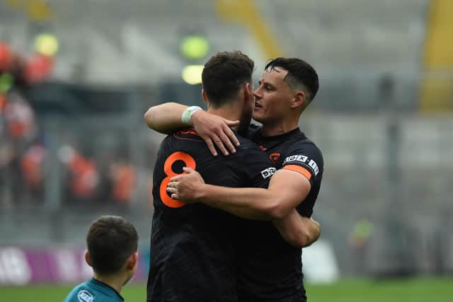 Armagh's Aaron McKay and Niall Grimley celebrate at end of game.