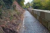 The Shore Road between Killowen and Rostrevor with concrete blocks put in place by DfI following a landslip in November 2023. Credit: Cllr Michael Rice.