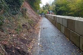 The Shore Road between Killowen and Rostrevor with concrete blocks put in place by DfI following a landslip in November 2023. Credit: Cllr Michael Rice.