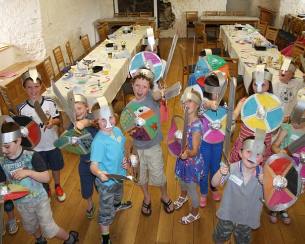 Children making Viking shields and swords at Newry and Mourne Museum Summer Camps.Newry and Mourne Museum Collection
