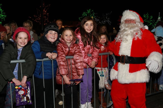 Santa Claus making his way around Crossmaglen Square saying hello to the boys and girls. INNR4953