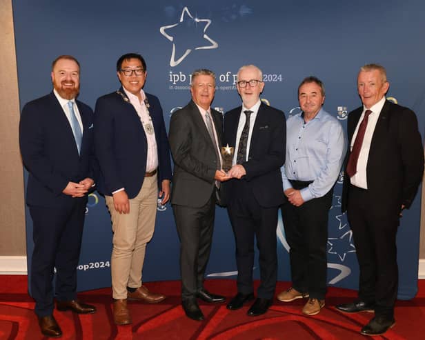IPB Pride of Place 2024: IPB Insurance CEO John Kearns (centre, left) presents the runner up award in the Community Well-Being Initiative category to Cuan Mhuire.