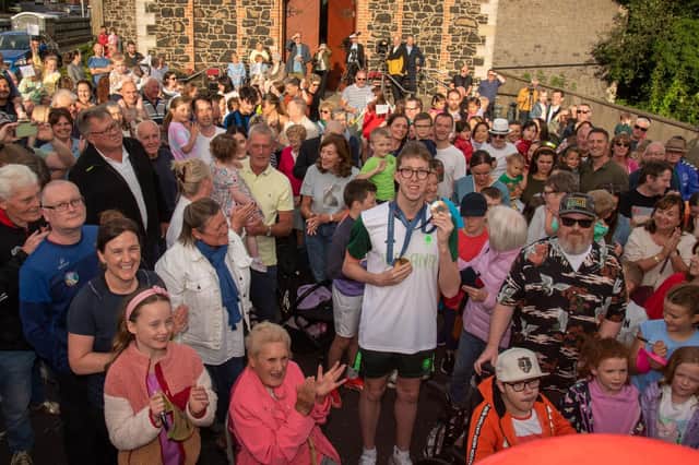 Daniel Wiffen poses with his fans at a 'welcome home' event.. LM33-207.