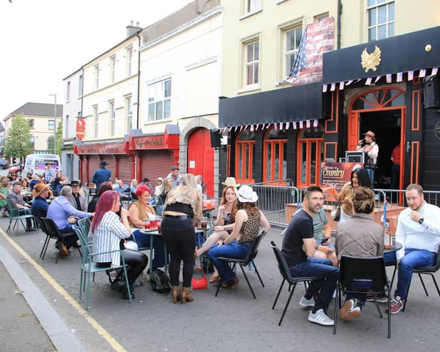 Newry's 'Nashville’ zone in a pedestrian space at Margaret Street with a free rodeo bull and entertainment. INNR2706