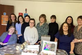 Staff at McShanes with Mrs Maureen Fegan as she marked her retirement.