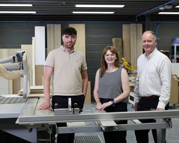 Breandan Hardy, MD Black Forest Joinery Ltd, Economy Minister Dr Caoimhe Archibald and Iain Joannides, Director of Regional Business, Invest NI.