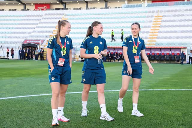Charlotte Havern (right) with fellow Northern Ireland footballers Aimee Kerr and Naomi McLaughlin at the Portimão Estádio, Portimao, for the FIFA Women's World Cup Play Off against Portugal. Pic: William Cherry/Presseye