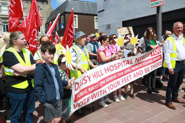 Banners and signs galore with one message 'Save Daisy Hill' INNR2701:dhh