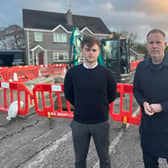 Mourne Cllr Michael Rice and South Down MP Chris Hazzard, pictured at the recent closure in Kilkeel, are requesting a full safety review of the A2 from Newcastle to Warrenpoint.