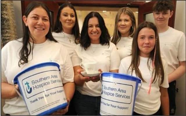 Pictured are the Morgan family, mum Aine and children Aimee, Erinn, Katie, Eoghan and Annie who are walking in memory of their late father Gene Morgan.
