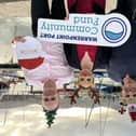 Michael Young, Harbour Master, Aislin Gebska, HR Officer and Danny Talbot, Executive Assistant, Warrenpoint Harbour are pictured getting into the Christmas Spirit to launch the Warrenpoint Harbour Christmas Community Fund