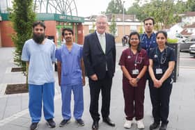 Health Minister Mike Nesbitt with internationally recruited doctors (from left): Urology Consultant Dr Sartaj Wali Khan; Radiology Consultant Dr Harsh Ketan Shah; Dr Ankita Dash, General Medicine; Dr Shivam Dutt, General Medicine, and Dr Kasthuri R Pillai, General Medicine.