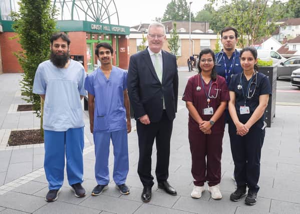 Health Minister Mike Nesbitt with internationally recruited doctors (from left): Urology Consultant Dr Sartaj Wali Khan; Radiology Consultant Dr Harsh Ketan Shah; Dr Ankita Dash, General Medicine; Dr Shivam Dutt, General Medicine, and Dr Kasthuri R Pillai, General Medicine.