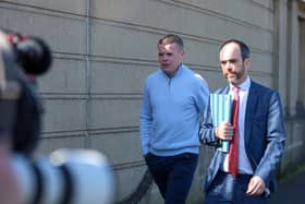 Armagh GAA star Aidan Nugent arrives at Newry Magistrates Court this morning with his solicitor, Patrick Higgins. Picture: Pacemaker.