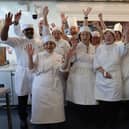 Chef Bootcamp participants celebrate at the end of their introduction to culinary arts.