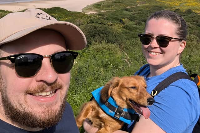 Karl Murray with his wife and dog.