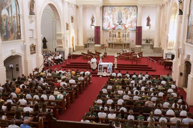 Mary Immaculate Catholic Church was packed for the memorial service.