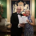 Blaithnid Hughes, SHSCT Head of Service Anaesthetics, Theatres and Intensive Care Services, receiving her Certificate of completion for the Centre of Democracy and Peace Building’s Fellowship Programme, Class of 2025, at a ceremony held on 3rd April in Royal Hillsborough Castle from Darragh McCarthy, Founder and CEO of FinTrU and serving Chair of the Fellowship Advisory Board.