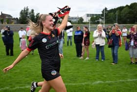 Down Camogs All-Ireland U23 C Champions celebrate with the trophy.