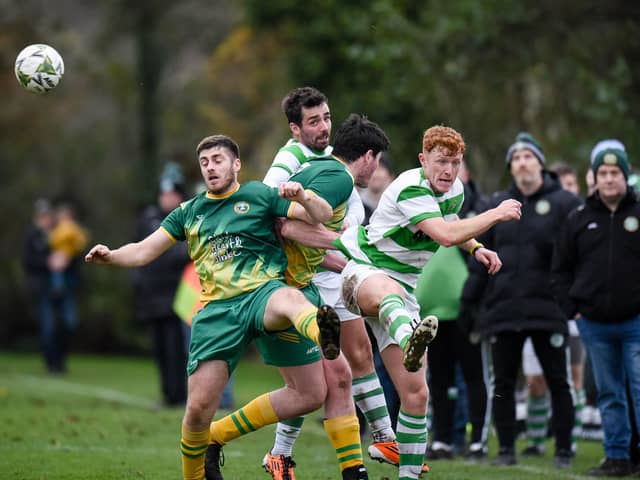 Midfield action from Ballyholland FC and Newry Celtic at Olympic Park on Saturday Picture: Brendan Monaghan BM14