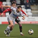 Crusaders' Mal Smyth in action with Newry’s  Lorcan Forde. Pic: Inpho/Stephen Hamilton