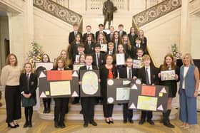 Infrastructure Minister Kimmins pictured with Year 8 students from New-Bridge Integrated College, Loughbrickland. The students have been campaigning for road safety improvements along the A1.