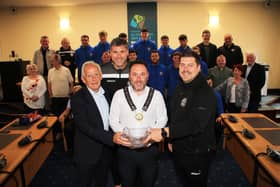 Chairperson Newry, Mourne and Down Council, Councillor Pete Byrne held a Civic Reception and welcomed members of Warrenpoint Town Football Club to the Boardroom at Monaghan Row to mark and celebrate their successful year and their Senior Team becoming the Premier Intermediate League Champions and also being promoted.  Council Chairperson then presented an inscribed crystal bowl to Club Chairman and Honorary President Johnny Bird, Coach Simon Nicks and Team Manager Gary Boyle.