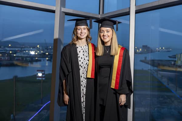 Molly Liggett from Poyntzpass and Aimee Clerkin from Rostrevor at the Accounting Technicians Ireland  graduations at  the Titanic Centre, Belfast. Pic: Fintan Clarke.
