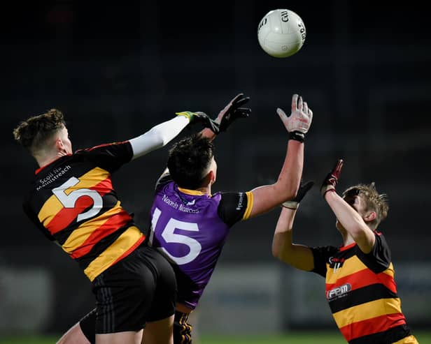 Midfield Rannafast cup action between Abbey CBS and St Mark's on Tuesday night at Pairc Esler Picture: Brendan Monaghan